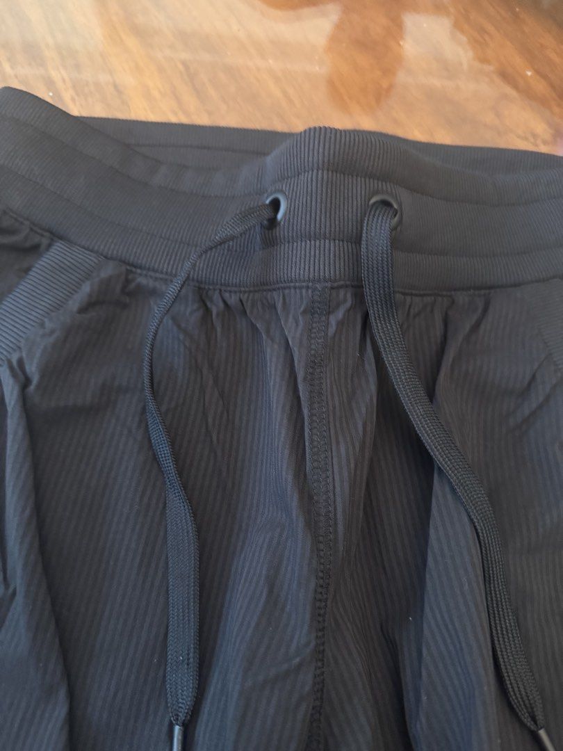 H&M Sport Pants - Size 6 (Category: Other Bottoms) located in Muntinlupa City. Submitted by secondchancechic (Listing ID 1426646294, Image 2). Description: Black H&M Sport pants with drawstring. Features a ribbed waistband and a textured fabric. Size US 6, EUR 36, and CN 165/68A. The pants have a relaxed fit with gathered details at the sides. Perfect for casual wear or light activities..