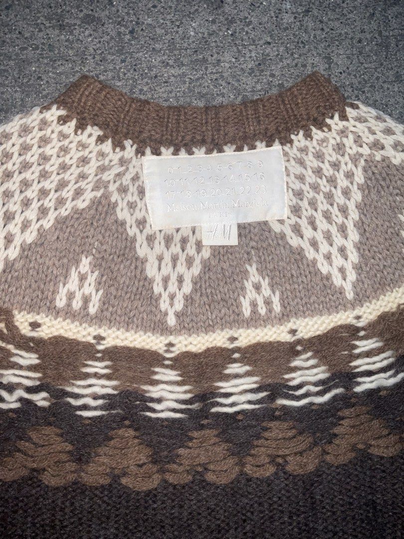 H&M x Maison Martin Margiela Patterned Sweater (Category: Coats, Jackets and Outerwear) located in Manila. Submitted by geloreyes262956 (Listing ID 1426718226, Image 3). Description: Maison Margiela x H&M Fair Isle wool-alpaca sweater Price: 5,***plus shipping •"Authentic" •Condition: 10/ 10 •Size: good for medium to large Color condition:10 / 10 apaca wool Measurements:📏 •L- 28inches •W- 19inches shoulder - sleeves -30 "Sure buyer only"⚠️ Mode 
