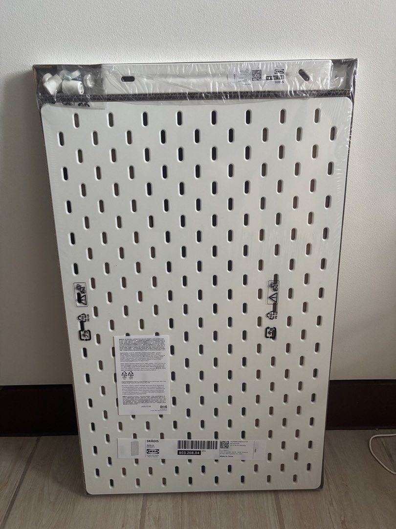 IKEA SKÅDIS Pegboard 36x56cm (Category: Home Improvement Tools & Accessories) located in Cavite. Submitted by theeverydayedit (Listing ID 1426630569, Image 1). Description: IKEA SKÅDIS pegboard. It is white and comes in its original packaging. The size is 36x56 cm (14 1/4x22 "). The item is new and unused..