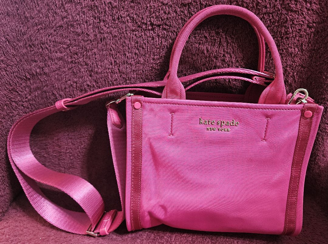 Kate Spade Sam Mini Tote (Category: Tote Bags) located in Makati City. Submitted by KuWeLaDevil01 (Listing ID 1426665617, Image 1). Description: All Authentic with original zippers and strap and tag. Vermillion in color and quality is very good, as this was only used twice. Some folds and light marks due to being in storage for a long time, but all in all, it is still a great tote. It has the main zippered compartment and two (2) pockets, the oth