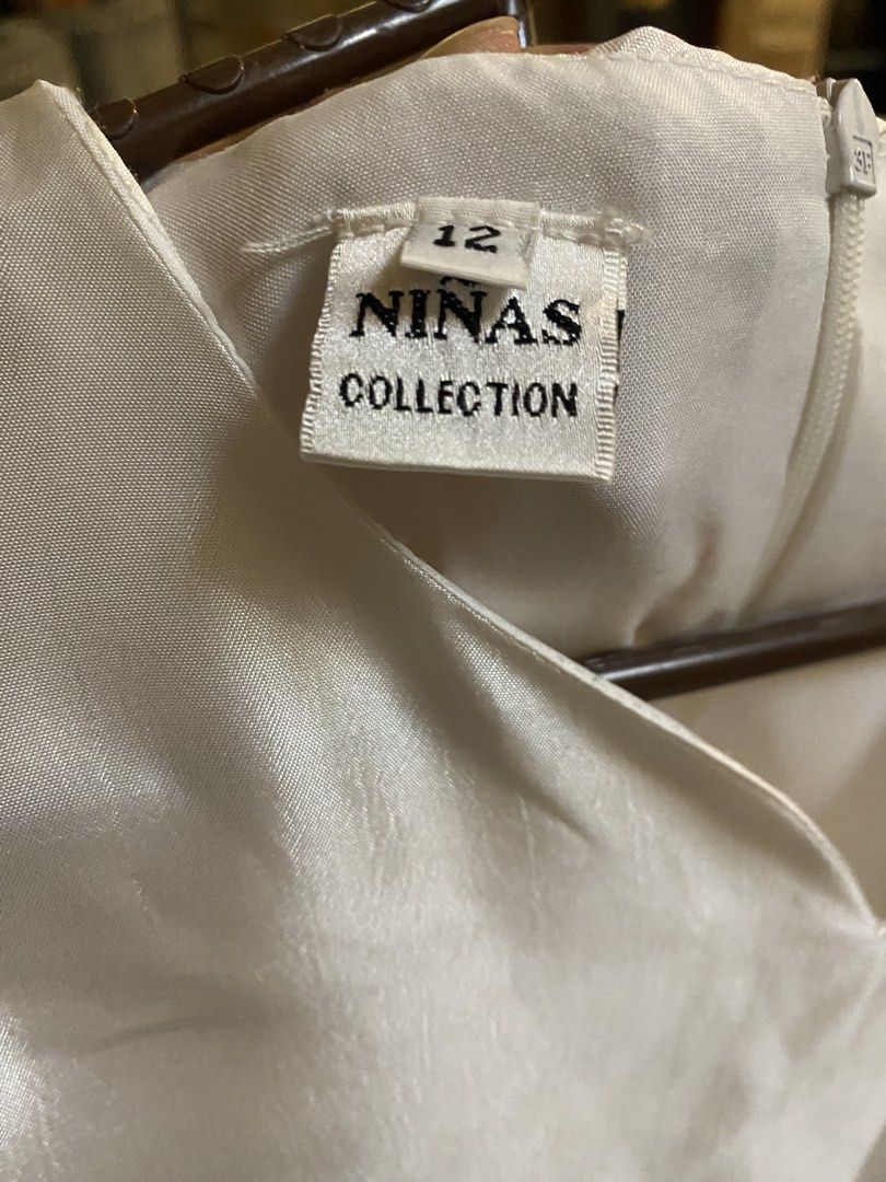 Kids white dress (Category: Babies & Kids Fashion) located in Pasig City. Submitted by notosscammers (Listing ID 1426739861, Image 3). Description: - Used for middle school catholic communion - Flaws are shown on the pics, can be removed once washed - Size 12 .