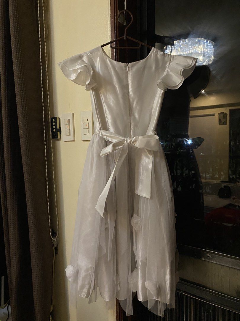Kids white dress (Category: Babies & Kids Fashion) located in Pasig City. Submitted by notosscammers (Listing ID 1426739861, Image 2). Description: - Used for middle school catholic communion - Flaws are shown on the pics, can be removed once washed - Size 12 .
