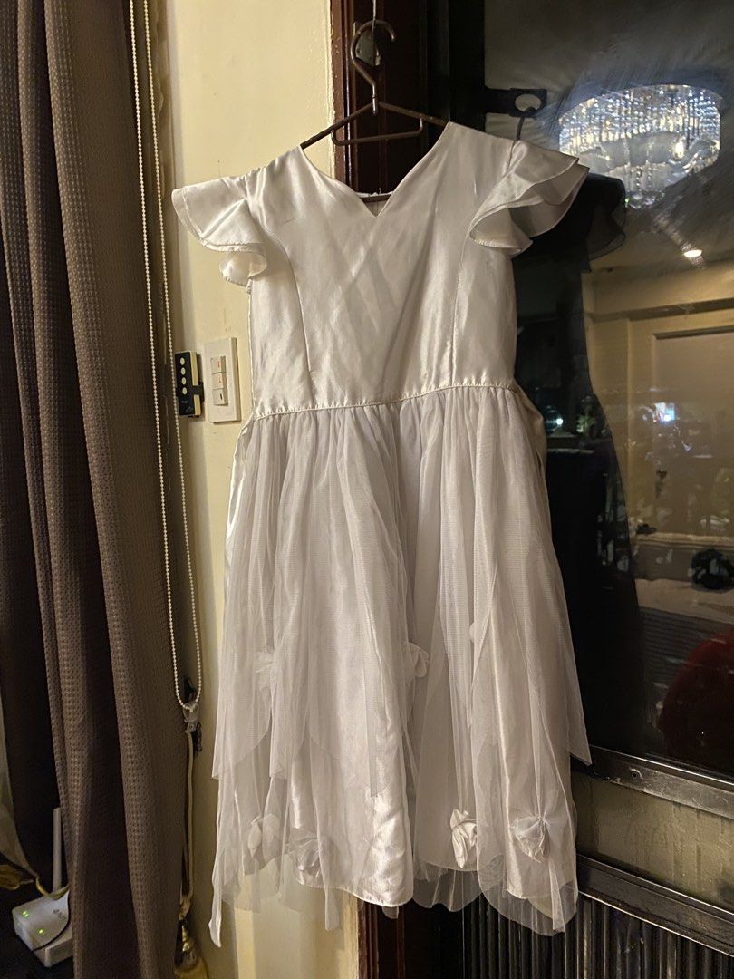 Kids white dress (Category: Babies & Kids Fashion) located in Pasig City. Submitted by notosscammers (Listing ID 1426739861, Image 1). Description: - Used for middle school catholic communion - Flaws are shown on the pics, can be removed once washed - Size 12 .