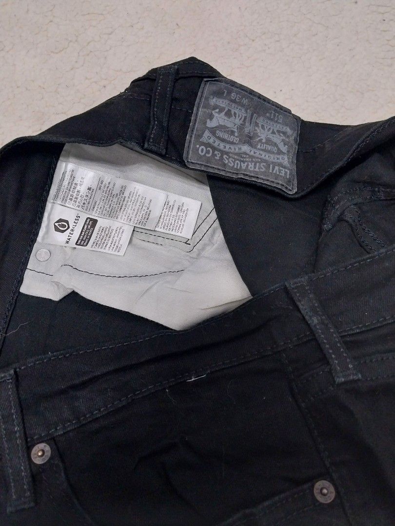 Levi's Black Denim Shorts (Category: Shorts) located in Malaybalay. Submitted by markdaumar08466 (Listing ID 1426644819, Image 3). Description: Black denim shorts from Levi's. Features a classic five-pocket design. The Levi's logo patch is visible on the back. The shorts have a button and zipper closure. The size tag is visible in the image..