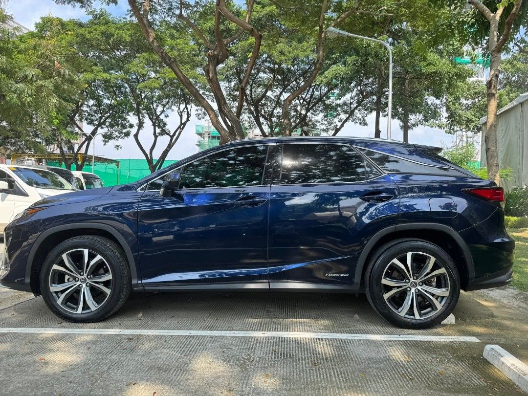 Lexus RX450 Hybrid Premium (A) (Category: Used Cars) located in Manila. Submitted by night.stalker_12 (Listing ID 1426654198, Image 2). Description: 🚙 2022 Lexus RX450h Hybrid SUV， NO CODING Only 36,000 KM | Excellent Condition | Fully Lexus-Serviced Luxury, performance, and hybrid efficiency in one SUV. Key Features: • 3.5L V6 + electric motor, 308 HP • Front heated & ventilated leather seats • 12.3” touchscreen, Apple CarPlay, Mark Levinson au