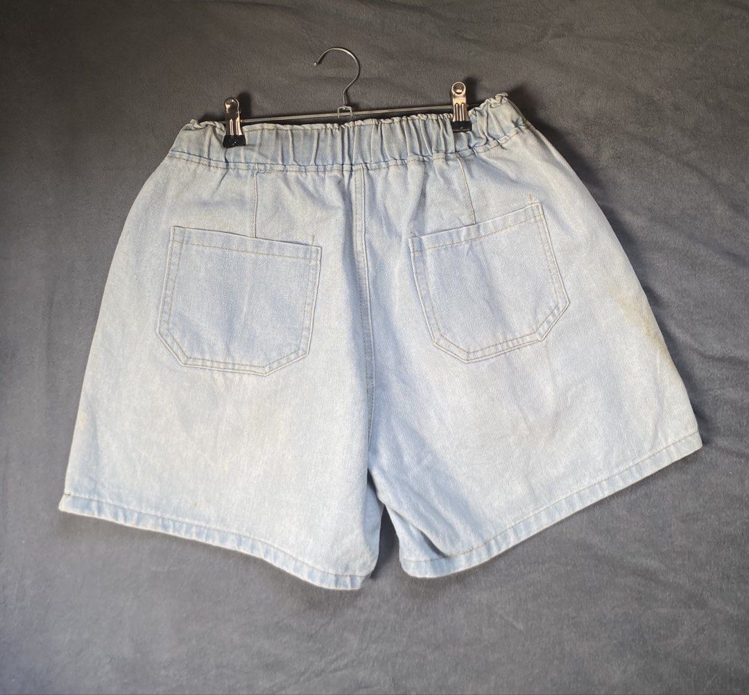 Light Blue Denim Shorts Size 30-32 (Category: Shorts) located in Mamburao. Submitted by marieac (Listing ID 1426646600, Image 2). Description: - Light blue denim shorts - Size 30-32 - Distressed design - Elastic waistband - Comfortable fit.