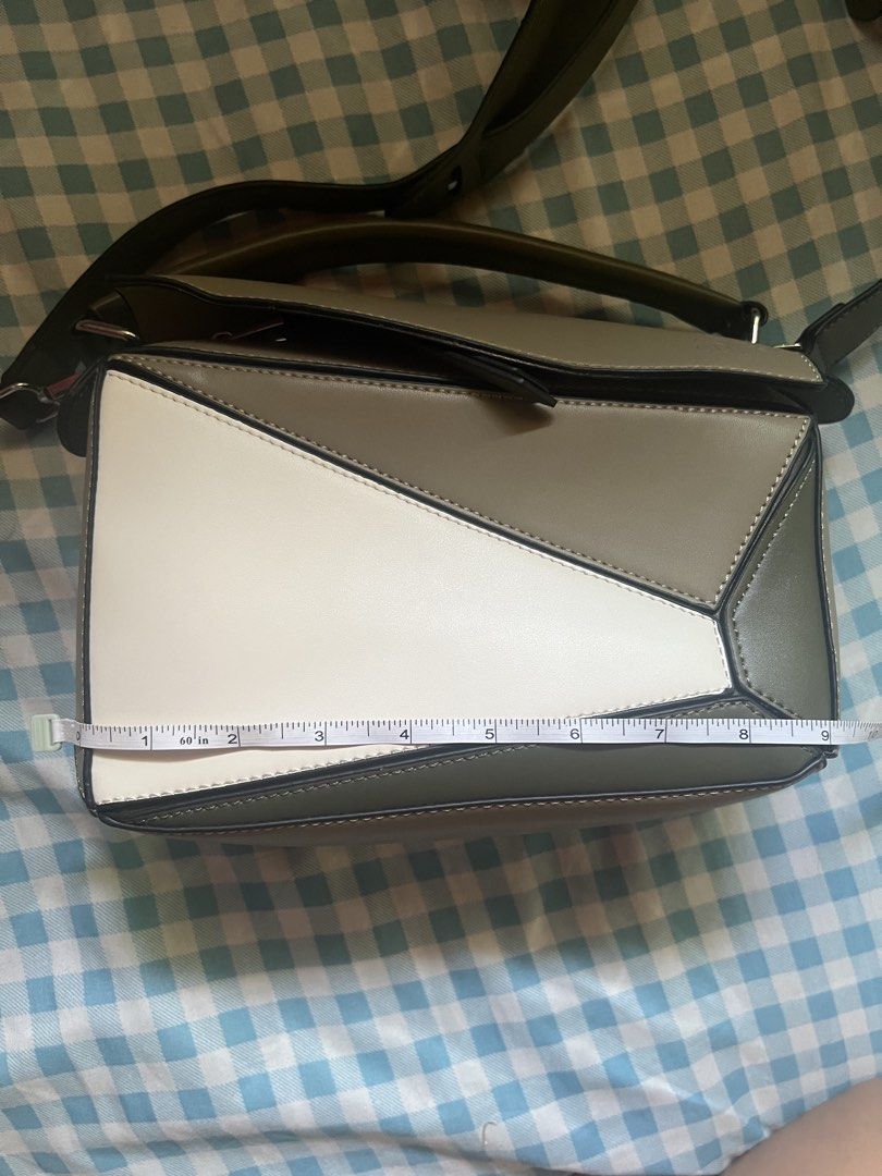 Loewe Puzzle Bag (Category: Luxury Bags & Wallets) located in Manila. Submitted by aujar12015 (Listing ID 1426675752, Image 3). Description: Preloved Loewe Mini Puzzle Bag Chic and stylish Mini Puzzle Bag with the iconic geometric design—perfect for elevating any outfit. Compact yet functional, great for daily use or casual outings. In preloved condition with normal signs of use. ⚠️ Authenticity not guaranteed. Please manage expectations before p