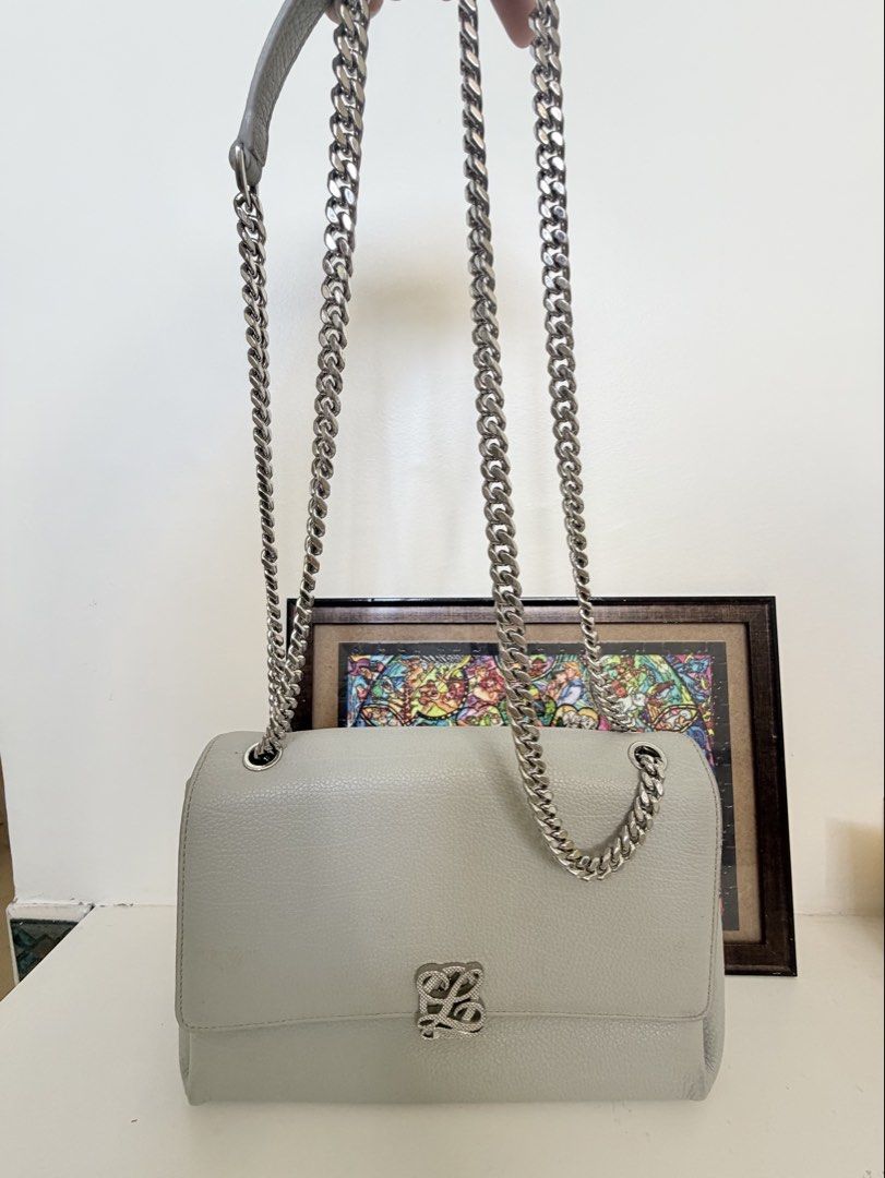 Louis Quatorze Grey Leather Chain Bag (Category: Luxury Bags & Wallets) located in Cebu City. Submitted by kawaiiparty (Listing ID 1426613534, Image 2). Description: Preloved LQ bag Leather is still in very good condition with minor signs of use on the edges pls see all pics Can be used as a shoulder or sling since the chain is adjustable Perfect for all rounder special occasions or just to add some glam to your everyday outfit.