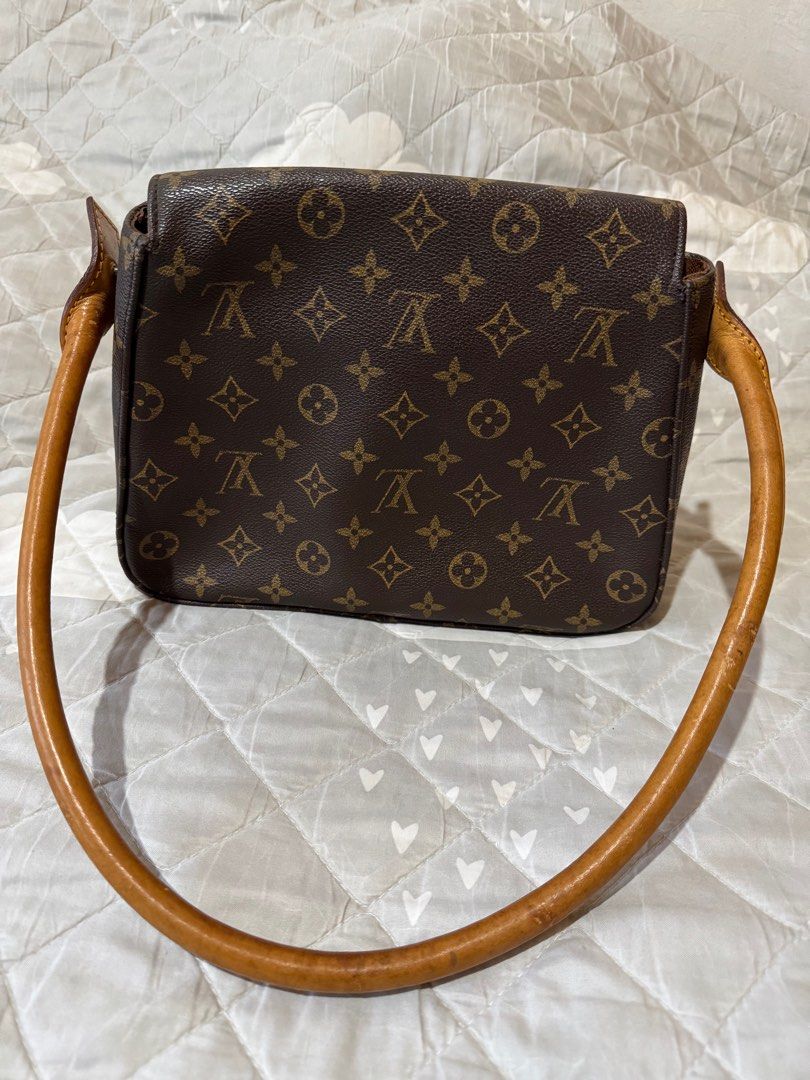 Louis Vuitton monogram Shoulder Bag (Category: Luxury Bags & Wallets) located in Danao, Cebu. Submitted by jojie.1983 (Listing ID 1426711086, Image 2). Description: - Louis Vuitton Looping Shoulder Bag - Features the signature monogram pattern - Shoulder bag design for easy carrying - Classic and timeless design - Interior with zipper pocket -excellent condition .