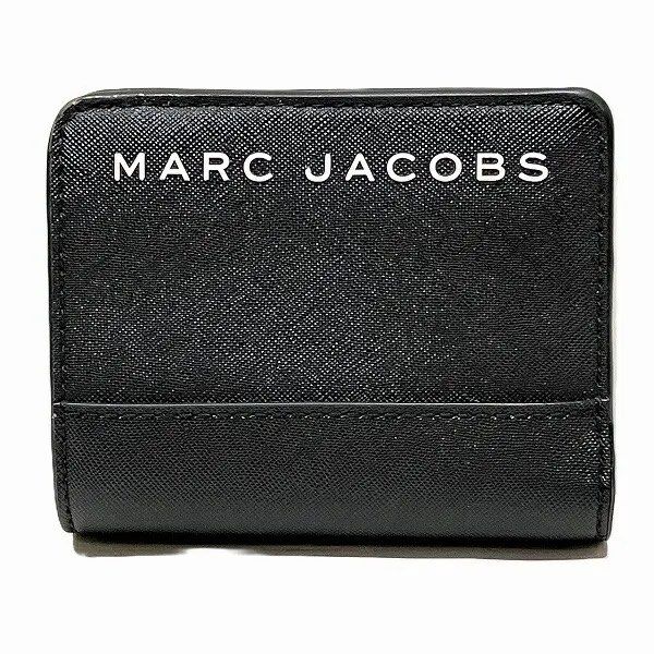 Marc Jacobs Black Leather Wallet (Category: Luxury Bags & Wallets) located in Tabaco. Submitted by QuinnOsalo (Listing ID 1426721514, Image 1). Description: Personal preloved bi-fold wallet Authentic Marc Jacobs Saffiano Mini Compact Wallet in color Black Material: Saffiano leather wallet featuring a hook button closure, bill compartment, and card slots. Original price: php 5000 RFS:Decluttering MOP:Gacsh MOD: Flash express .