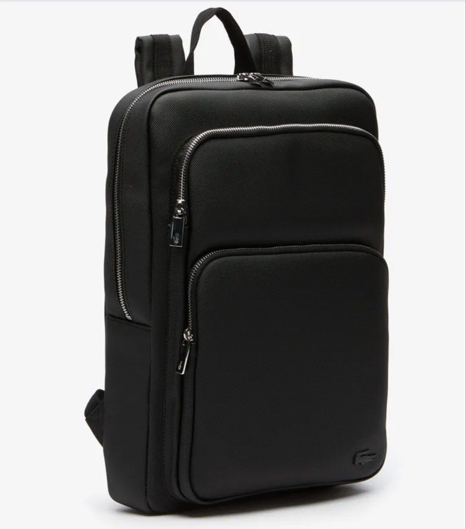 Original Men's Classic Petit Pique Black Backpack (Category: Backpacks) located in Pasig City. Submitted by samuraibry7 (Listing ID 1426645851, Image 3). Description: - Minimal sign of usage on the logo, other than that it’s all good as new. - with paper bag and dashbag Inspired by the brand’s heritage, this backpack is crafted from quilted canvas, with a laptop compartment and two front pockets, making it a simple, classic option for commuting o