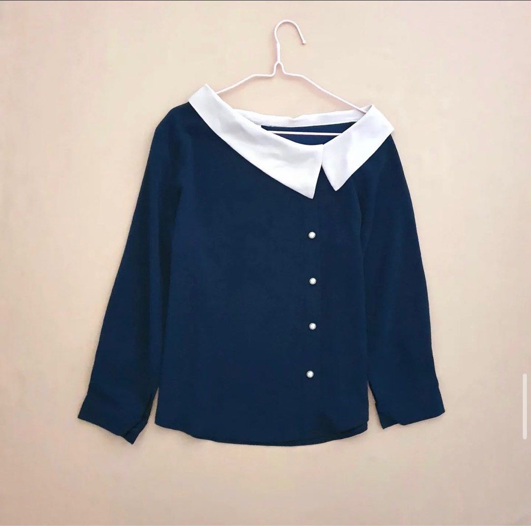 Navy Blue sailor collar longsleeves blouse thick (Category: Blouses) located in Quezon City. Submitted by nikkatan14 (Listing ID 1426748773, Image 1). Description: Side collar and buttons (not center) (see last pic for when worn. Fits medium to large. See pics for dimensions. RFS migrating. Pickup in Matandang Balara, Quezon City.
