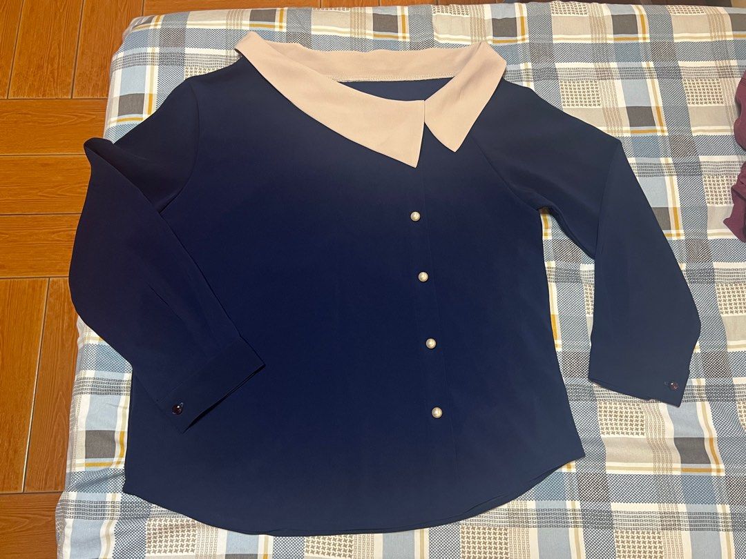 Navy Blue sailor collar longsleeves blouse thick (Category: Blouses) located in Quezon City. Submitted by nikkatan14 (Listing ID 1426748773, Image 3). Description: Side collar and buttons (not center) (see last pic for when worn. Fits medium to large. See pics for dimensions. RFS migrating. Pickup in Matandang Balara, Quezon City.