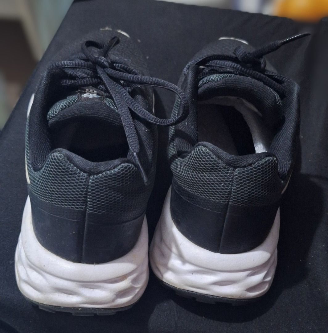 Nike Revolution 6 Black Running Shoes (Category: Sneakers) located in Taguig. Submitted by happyhart88 (Listing ID 1426694872, Image 2). Description: Nike running shoes Size: US 6 Preloved but still in good condition. Sole still has good grip (see photo). No major damage, only normal signs of use. No box. RFS: Decluttering 💰 Slightly negotiable for sure buyer 🚚 Shipping via J&T / Lalamove / Meet-up if nearby First to pay gets priority. #nike #n