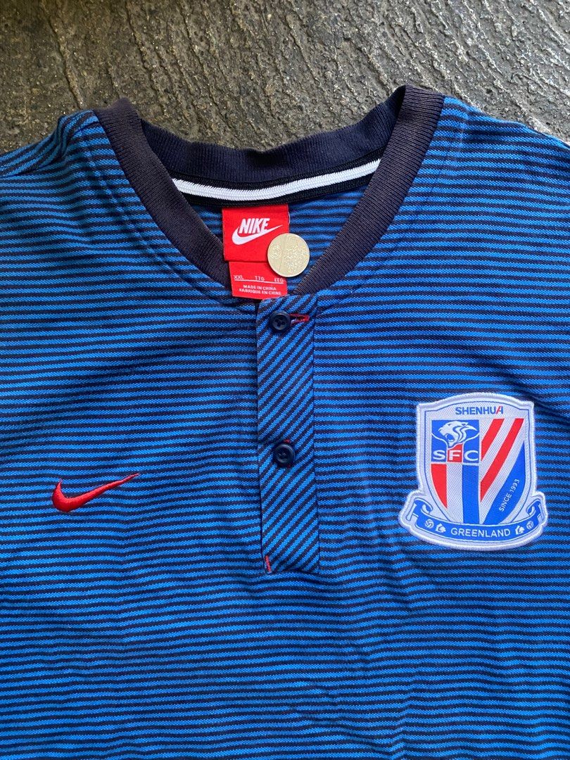 Nike Shanghai Shenhua Jersey (Category: Tshirts & Polo Shirts ) located in Caloocan City. Submitted by hustlenhunt (Listing ID 1426636374, Image 2). Description: Dimes: W-20 L-29 -Condition: 9/10 -Need Wash -Issue may minimal sira sa stitching ng washtags+ may hand stitch (makikita sa photo) -Color fade neckline.