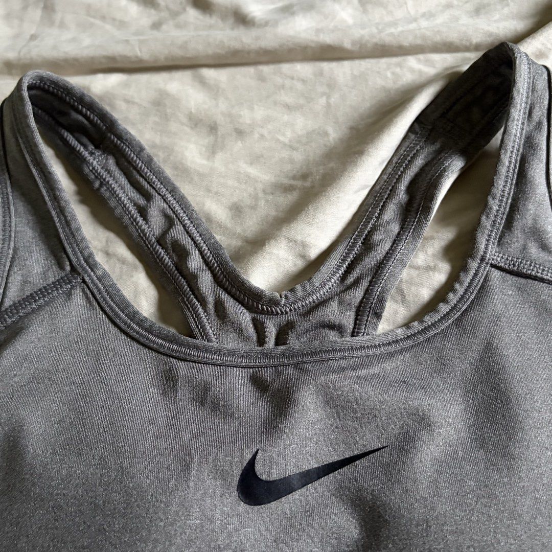 Nike Sportsbra (Category: Activewear) located in Tarlac. Submitted by 3fted (Listing ID 1426643218, Image 2). Description: nike medium on tag size in inches (laid flat measurement) -- bust: 13 in -- band: 11 in with pads and pad slot 9.5/ 10 condition -- very good condi! semi bacon pero di na halata pag suot since ma stretch na tela Color Rate: 10/10 Cloth Rate: 10/10.