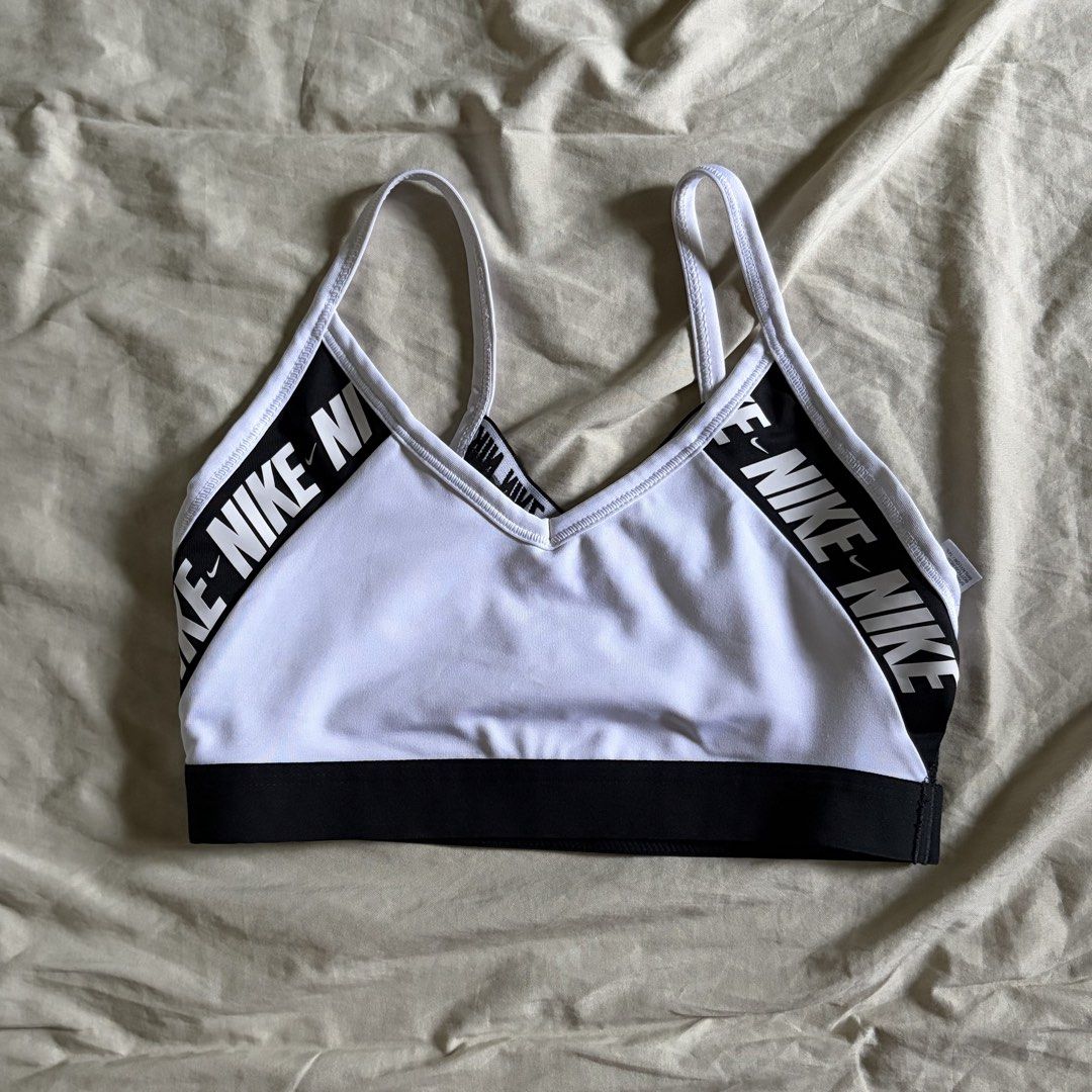 Nike Sportsbra (Category: Activewear) located in Tarlac. Submitted by 3fted (Listing ID 1426644646, Image 1). Description: nike med on tag size in inches (laid flat measurement) -- bust: 12 in -- band: 11 in no pads but with pad slot 10/ 10 condition -- rare design! Color Rate: 10/10 Cloth Rate: 10/10 .