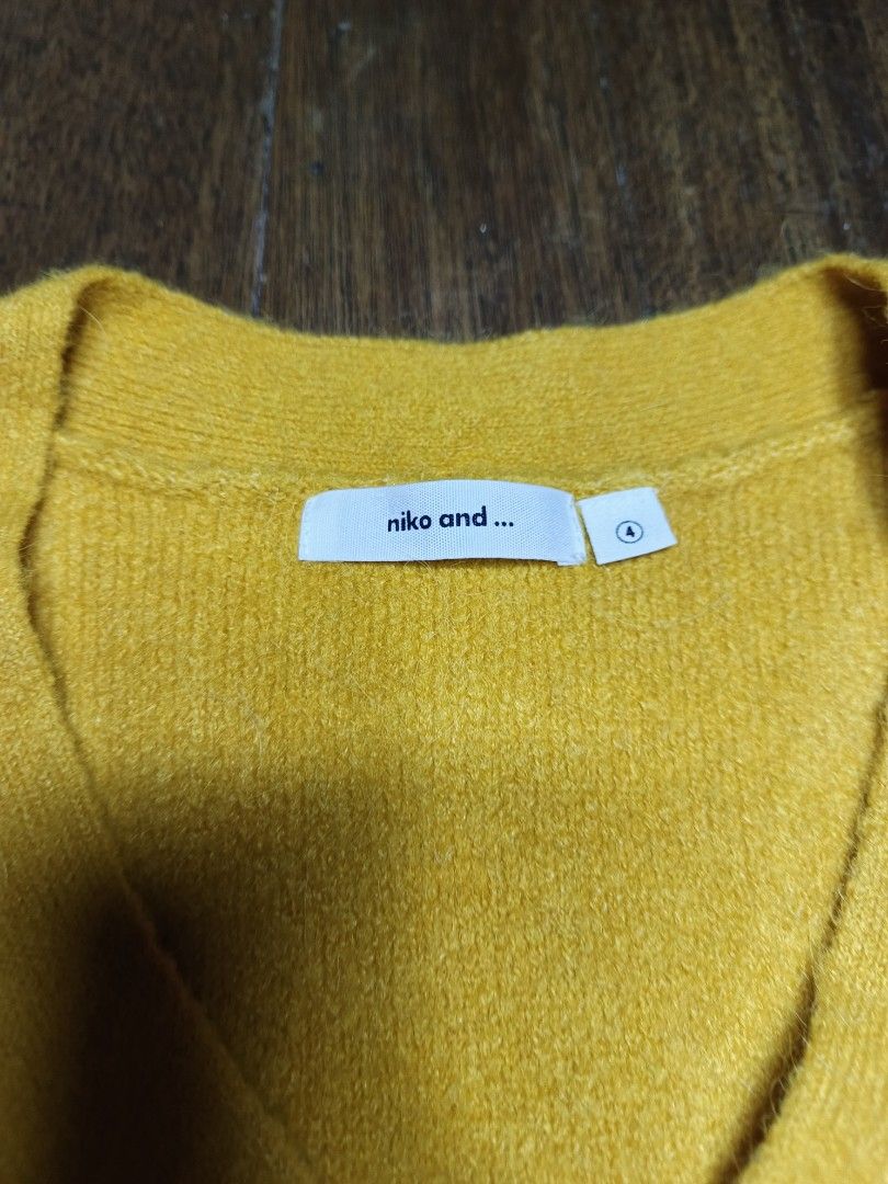 Niko and... V-Neck Sweater medium mens (Category: Coats, Jackets and Outerwear) located in Mandaluyong City. Submitted by heatgear (Listing ID 1426729544, Image 2). Description: good condition no issue size 4 on tag unisex dimension L26 w22 700 + sf location mandaluyong.
