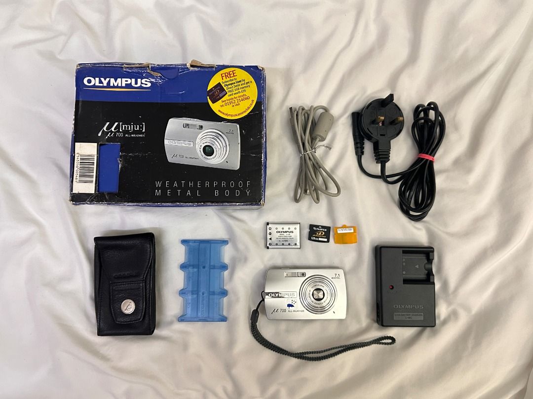 Olympus µ700 All-Weather Digital Camera (Category: Cameras) located in Taguig. Submitted by jrentengco (Listing ID 1426726261, Image 1). Description: *updated price due to inclusion of XD card - NO ISSUES - All functions are working - Pwede sa maarte - with video - Really gives the VINTAGE VIBE Color: Silver Year: 2006 Features: 7.1 MP, 3x Optical Zoom, 2.5 inch LCD Body: Metal Inclusions: - Original Box - Original Charger - Original 128mb Memory