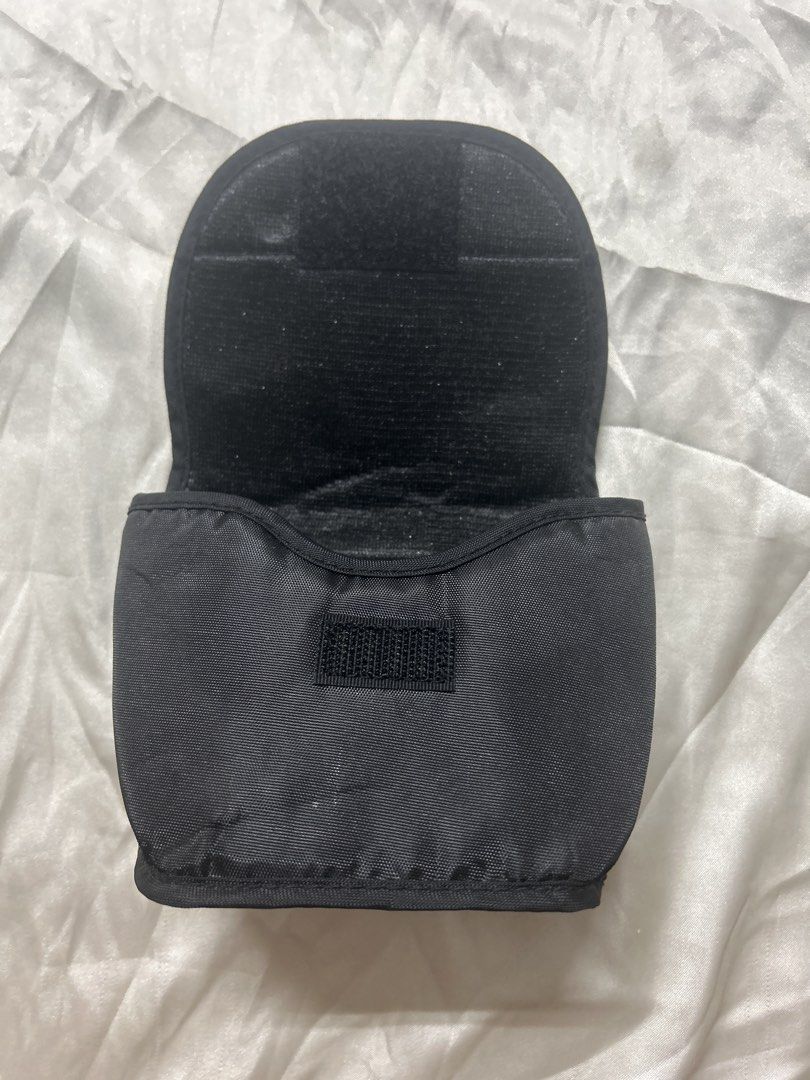 Olympus Camera Case/ for belt (Category: Camera Bags & Carriers) located in Bulacan. Submitted by ourdailybreads (Listing ID 1426667813, Image 3). Description: Black Olympus camera case. Features a flap closure with the Olympus logo. Includes a belt loop on the back for easy carrying. The interior is lined with a soft material to protect the camera..