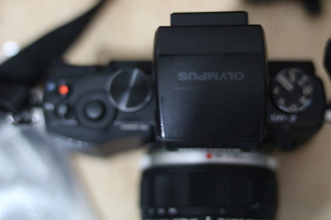 Olympus OM-D E-M5 Camera with Lens (Category: Cameras) located in Pasay City. Submitted by anne__alog (Listing ID 1426702406, Image 2). Description: -Micro Four Thirds interchangeable lens system camera -16.1 megapixels 4/3 Live MOS Sensor 200 – 25600 ISO sensitivity -5 axis image stabilisation -Autofocus with image contrast detection system and 35 focusing points -9 fps continuous shooting with single AF mode -Full HD: MOV (MPEG-4AVC/H.264 ) and
