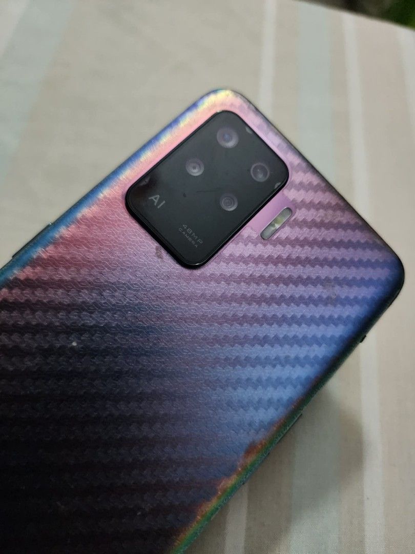 Oppo A94 (128GB) Mobile Phone / Cellphone (Category: OPPO) located in Quezon City. Submitted by sebbysprelovedgoods (Listing ID 1426705661, Image 3). Description: Second hand Oppo mobile phone: > Model: CPH2203 > Proceessor: Octa-core > RAM: 8GB > Battery Capaciyy: 4310 mAh (TYP) > Screen size: 6.43 in Cameras: Front 32MP Rear 48MP + 8MP + 2MP + 2MP Condition: 8/10.