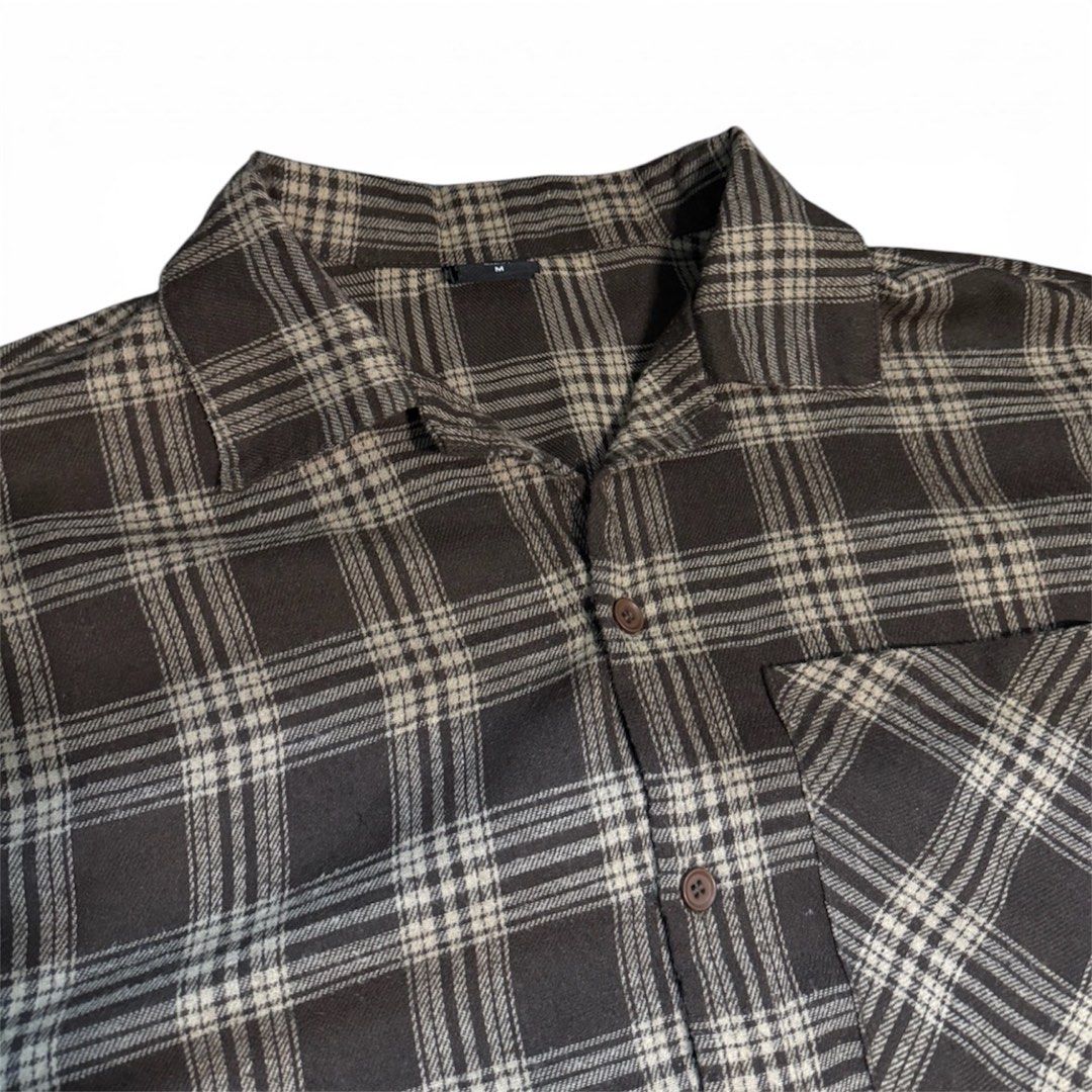 Oxgyn brown Plaid flannel (Category: Coats, Jackets and Outerwear) located in Manila. Submitted by dja23 (Listing ID 1426758419, Image 2). Description: Width: 23 in Length: 26 in front, 28 in back Sleeve: 24 in Used with care, no issue, color may vary due to lighting.