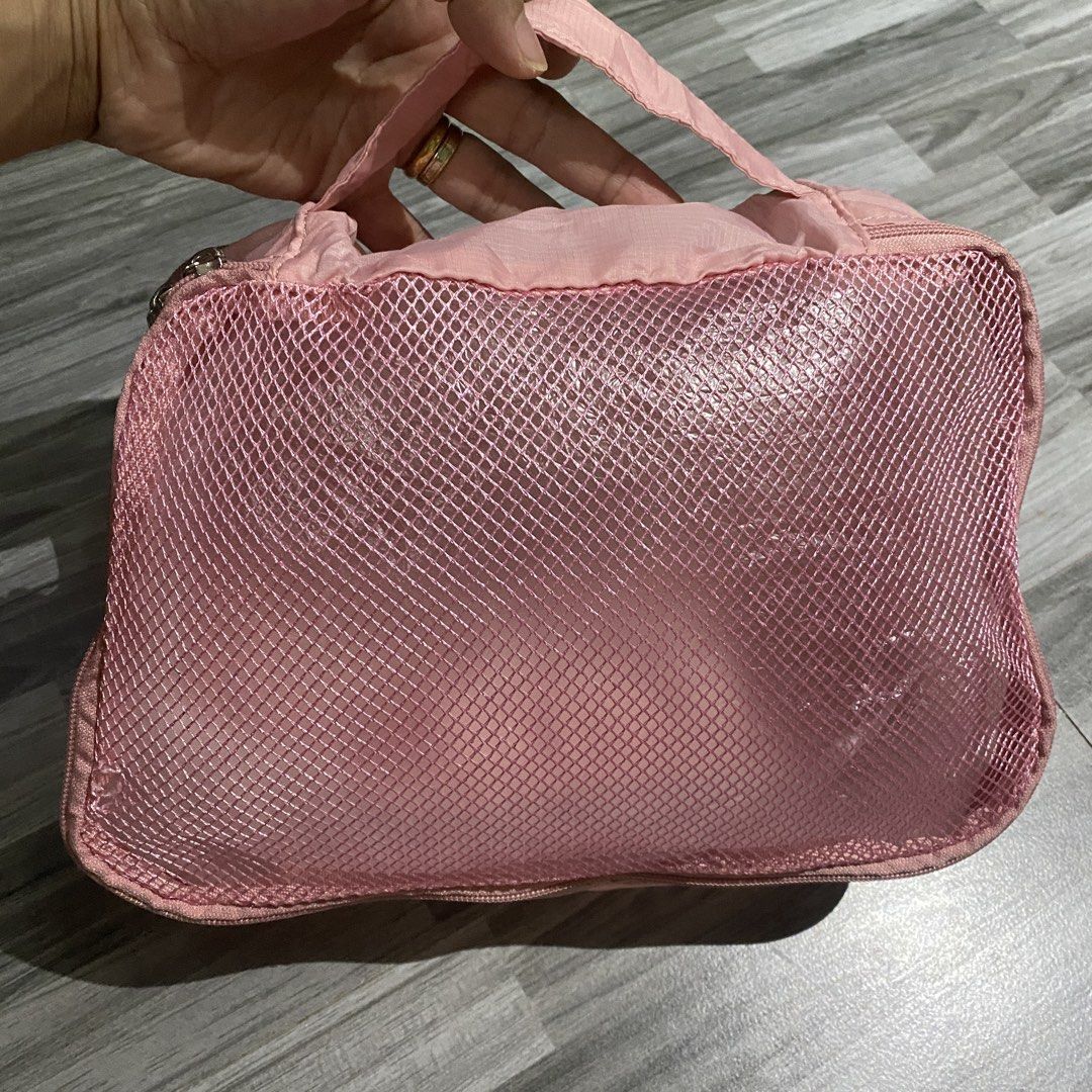 Pink Expandable Travel Pouch Set (Category: Makeup) located in Antipolo. Submitted by marcoandpaolomerchandise (Listing ID 1426746796, Image 2). Description: Travel Pouch Expandable Organizer 10”x8” Ganda ng Color nito Preloved Good Condition May 2 maliit na butas ( Please check Photos ) Location: Pagrai Antipolo J&T Sf 55 Luzon 🔹 80 Vismin Please po , HUWAG po mag offer kung hindi sure buyer , kase once nag Offer kayo nahingi ng Review si Carou