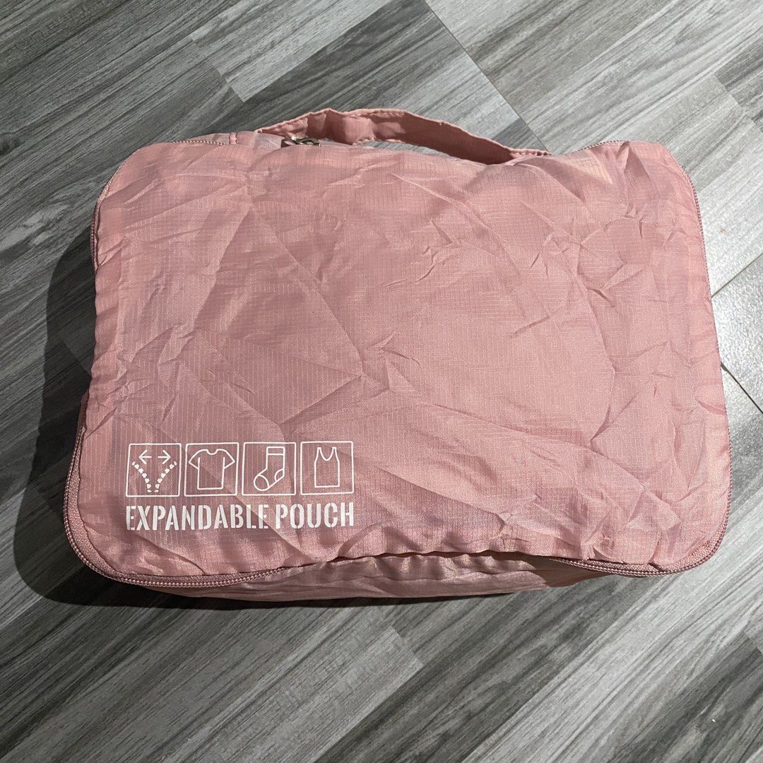 Pink Expandable Travel Pouch Set (Category: Makeup) located in Antipolo. Submitted by marcoandpaolomerchandise (Listing ID 1426746796, Image 3). Description: Travel Pouch Expandable Organizer 10”x8” Ganda ng Color nito Preloved Good Condition May 2 maliit na butas ( Please check Photos ) Location: Pagrai Antipolo J&T Sf 55 Luzon 🔹 80 Vismin Please po , HUWAG po mag offer kung hindi sure buyer , kase once nag Offer kayo nahingi ng Review si Carou