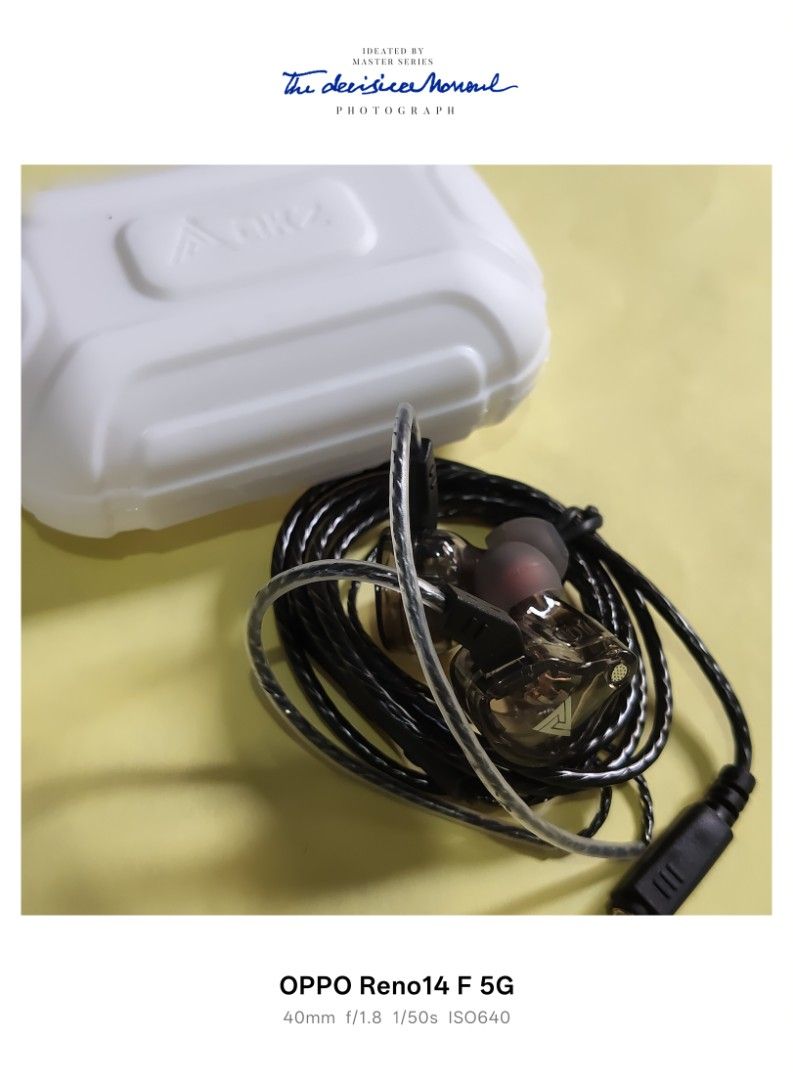 QKZ AK6 In-Ear Monitors (Category: Earphones) located in Paranaque City. Submitted by audioaddict0517 (Listing ID 1426669262, Image 3). Description: KZ AK6 in-ear monitors. Includes the earphones, original packaging, and a carrying case. The earphones have a black cable and a 3.5mm jack. The earphones themselves have a transparent design with a silver logo. The box indicates -Res Audio..