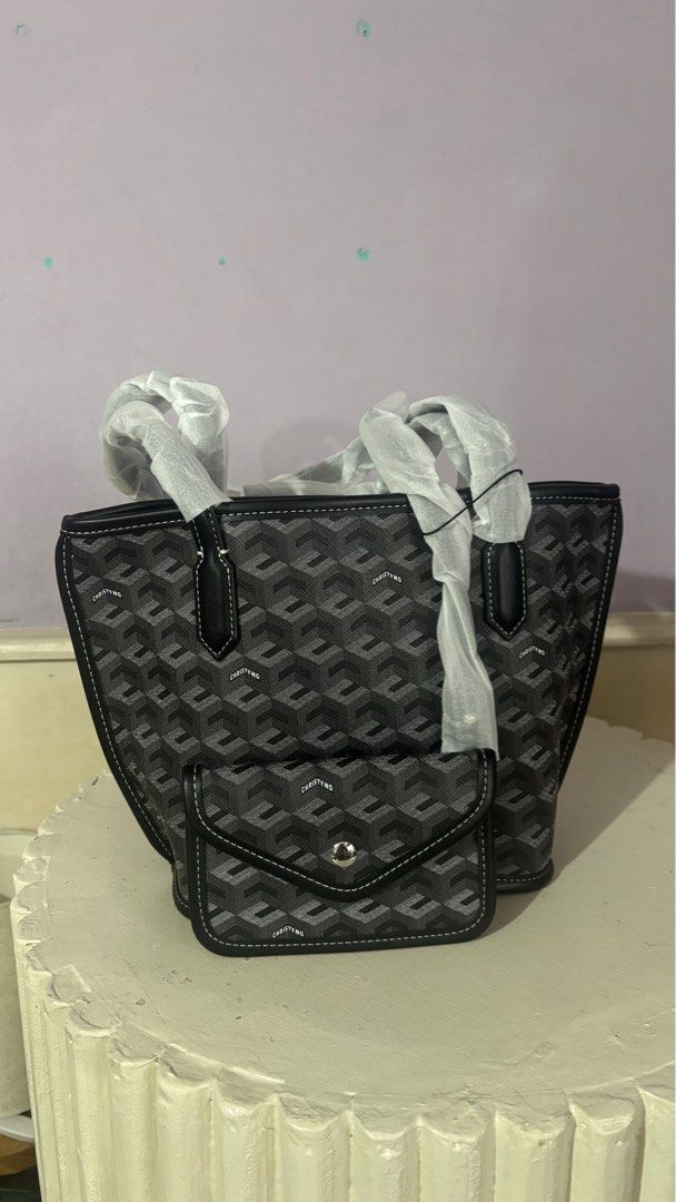 RUSSO MINI Christy Ng Tote Bag (Category: Tote Bags) located in Quezon City. Submitted by camchoose0 (Listing ID 1426628670, Image 2). Description: Russo Mini Tote Bag - Black brand new direct from MALAYSIA PAPER BAG AND DUSTBAG INCLUDED LAST PRICE NA PO ITO .