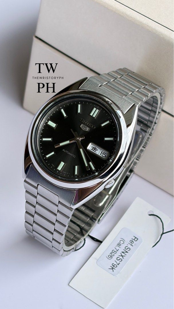 Seiko 5 SNXS79K1 (Category: Men's Watches) located in Caloocan City. Submitted by thewristoryph (Listing ID 1426656787, Image 3). Description: Seiko 5 SNXS79K1 - Black Sunburst Dial - Case Diameter: 37mm - 7S26 Automatic Movement - Kanji/English Daywheel - Brandnew - Inclusions: Double box, Booklet, Warranty Card, Hang Tag - 3 Years Warranty PHP 8,490 only 📲 Follow us on FB / IG / TikTok: @TheWristoryph 📍North Caloocan .