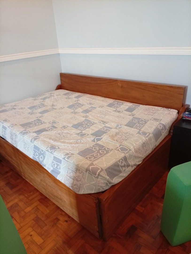 Solid Narra Wood Bed Frame with Pull-Out Bed (Category: Bed Frames & Mattresses) located in Makati City. Submitted by jefferson25043 (Listing ID 1426601241, Image 2). Description: Solid Narra Wood bed frame with a pull-out bed. Free 2 foam cushions.