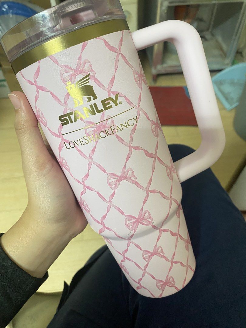 Stanley Loves Shackfancy Tumbler (Category: Water Bottles & Tumblers) located in Paranaque City. Submitted by mszhrhsgd (Listing ID 1416248369, Image 1). Description: Stanley Loves Shackfancy tumbler in pink floral design (right tumbler) Includes handle and lid. Keeps drinks cold or hot. Includes the stanley pink tumbler bag No box :( Bought in the US With minimal dents and scratches. Message me for the details.