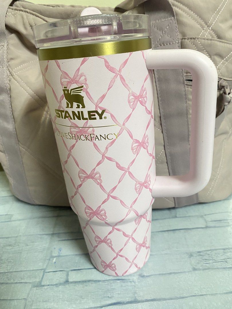 Stanley Loves Shackfancy Tumbler (Category: Water Bottles & Tumblers) located in Paranaque City. Submitted by mszhrhsgd (Listing ID 1416248369, Image 3). Description: Stanley Loves Shackfancy tumbler in pink floral design (right tumbler) Includes handle and lid. Keeps drinks cold or hot. Includes the stanley pink tumbler bag No box :( Bought in the US With minimal dents and scratches. Message me for the details.