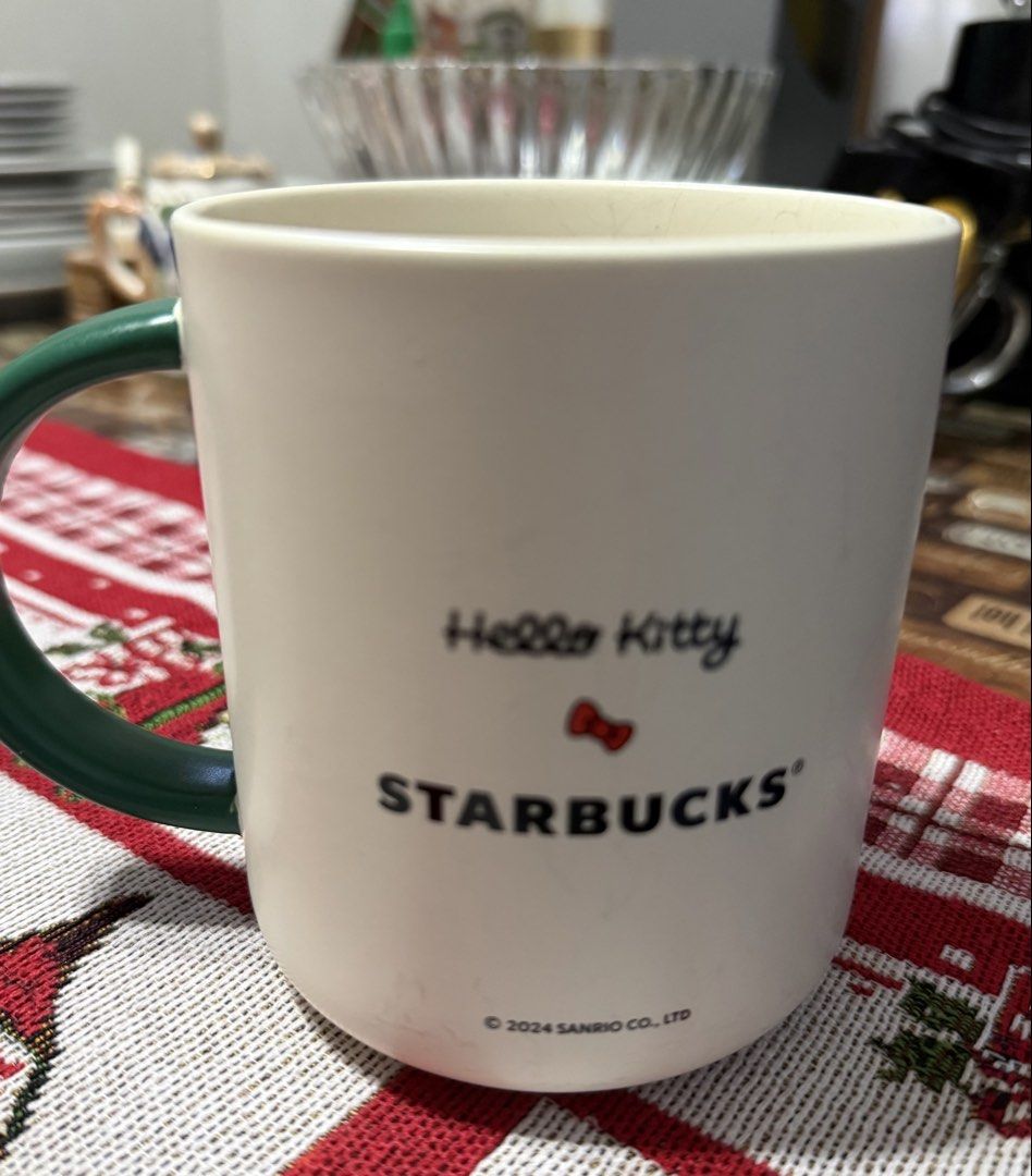 Starbucks Hello Kitty Mug (collectible) with slight issue (Category: Coffee & Tea Tableware) located in Mandaue City. Submitted by erin_grace (Listing ID 1426640416, Image 2). Description: Issues: very small chip (shown in photos) signs of use inside the mug .