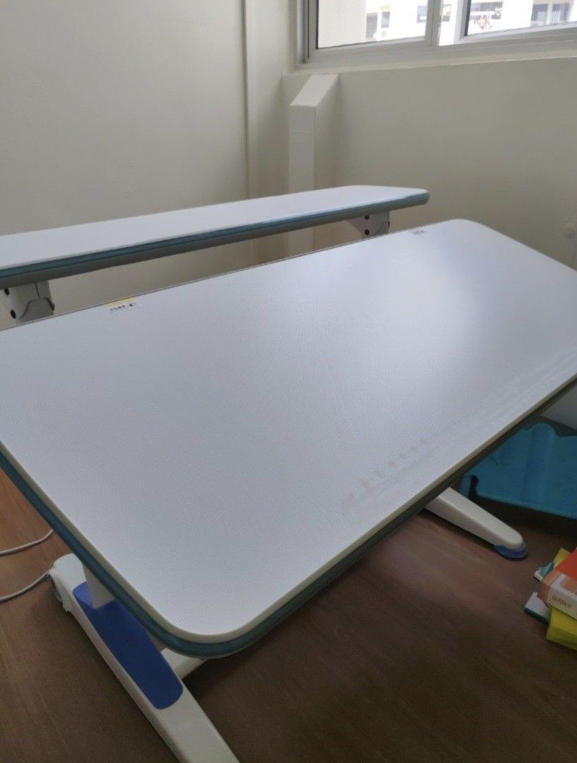 Study Table (Category: Other Home Furniture) located in Singapore. Submitted by sago (Listing ID 1426711438, Image 3). Description: Adjustable height from 52cm to 76cm. Width about 114 to 115cm. Paid over $800 for the table. Please arrange own transport. Collect at 460534..