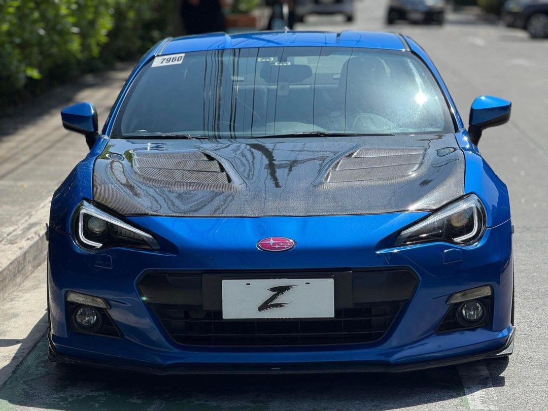Subaru BRZ STI Concept Auto (Category: Used Cars) located in Manila. Submitted by quality_cars (Listing ID 1426692614, Image 1). Description: Fresh In‼️ For Sale | Trade-In | Financing Accepted 2013 Subaru BRZ STI Concept 🔱 Automatic Transmission Mileage: 33k+ Original Mileage Ending Plate: Thursday Coding Color: World Rally Blue Engine: 2.0L Boxer Engine Fuel Type: Gasoline Upgrades & Features: Original STi Body Kits & Accessories - STI Chin - 