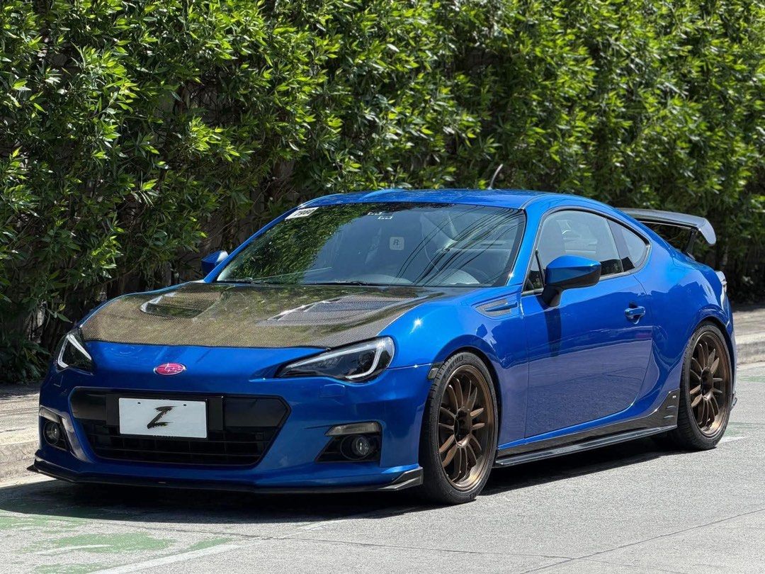 Subaru BRZ STI Concept Auto (Category: Used Cars) located in Manila. Submitted by quality_cars (Listing ID 1426692614, Image 3). Description: Fresh In‼️ For Sale | Trade-In | Financing Accepted 2013 Subaru BRZ STI Concept 🔱 Automatic Transmission Mileage: 33k+ Original Mileage Ending Plate: Thursday Coding Color: World Rally Blue Engine: 2.0L Boxer Engine Fuel Type: Gasoline Upgrades & Features: Original STi Body Kits & Accessories - STI Chin - 