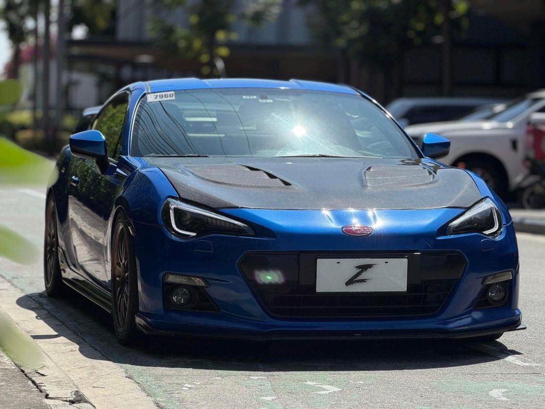Subaru BRZ STI Concept Auto (Category: Used Cars) located in Manila. Submitted by quality_cars (Listing ID 1426692614, Image 2). Description: Fresh In‼️ For Sale | Trade-In | Financing Accepted 2013 Subaru BRZ STI Concept 🔱 Automatic Transmission Mileage: 33k+ Original Mileage Ending Plate: Thursday Coding Color: World Rally Blue Engine: 2.0L Boxer Engine Fuel Type: Gasoline Upgrades & Features: Original STi Body Kits & Accessories - STI Chin - 