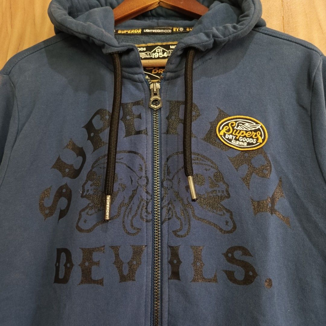 Superdry Super Devils Zip Hoodie (Category: Coats, Jackets and Outerwear) located in Batangas. Submitted by thriftpingssph (Listing ID 1426713272, Image 3). Description: 22x27 No Issue No Flaws 10/10 Condition Colorate.
