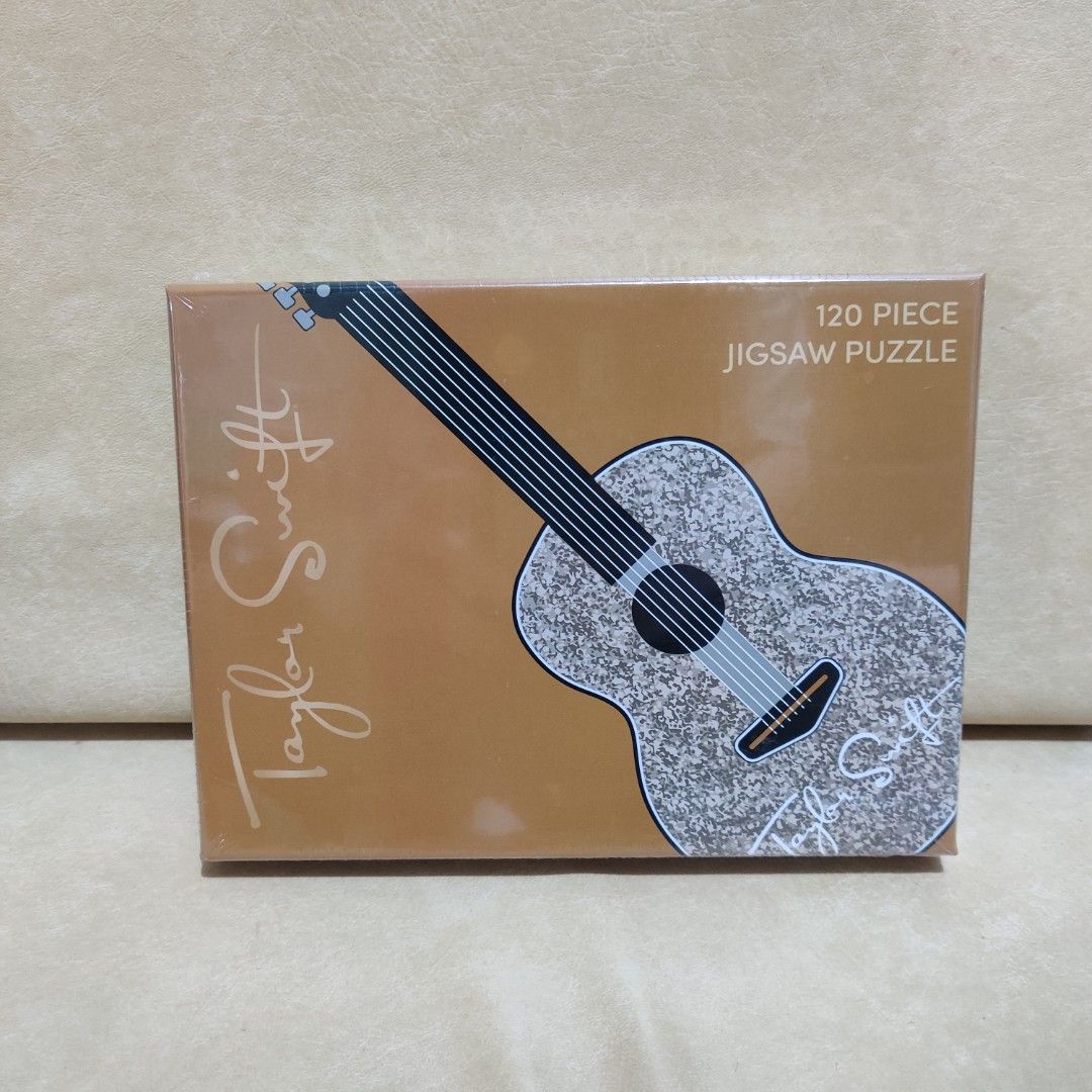 Taylor Swift Guitar Puzzle (Category: CDs & DVDs) located in Manila. Submitted by chin.tan (Listing ID 1426751563, Image 1). Description: Selling my Taylor Swift Guitar puzzle (Sealed) for P3,500. You can message me for more details. Thank you. MOP - Gcash MOD - GGX or SDD (book and shoulder by buyer).