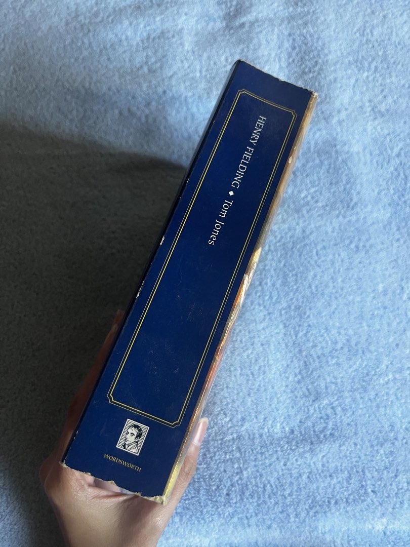 Tom Jones by Henry Fielding (Category: Storybooks) located in Cebu City. Submitted by kittyalliv (Listing ID 1426591915, Image 3). Description: Tom Jones by Henry Fielding | ₱199 The History of Tom Jones, a Foundling (1749) by Henry Fielding is a comedic picaresque novel following Tom, a charming but reckless orphan raised by the wealthy Squire Allworthy. After being banished due to scheming by his rival, Blifil, Tom navigates romantic entangleme