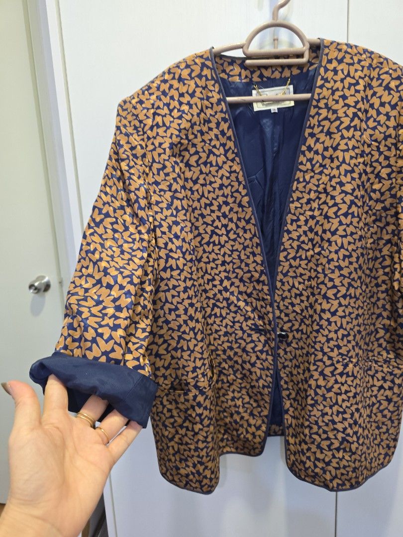 Vintage Patterned Jacket (Category: Coats, Jackets and Outerwear) located in Kuala Lumpur. Submitted by ghilosophy (Listing ID 1426757521, Image 2). Description: Vintage jacket features a unique pattern with a navy blue and gold color scheme. It has a navy blue lining and cuffs. It has a classic cut and a collar..