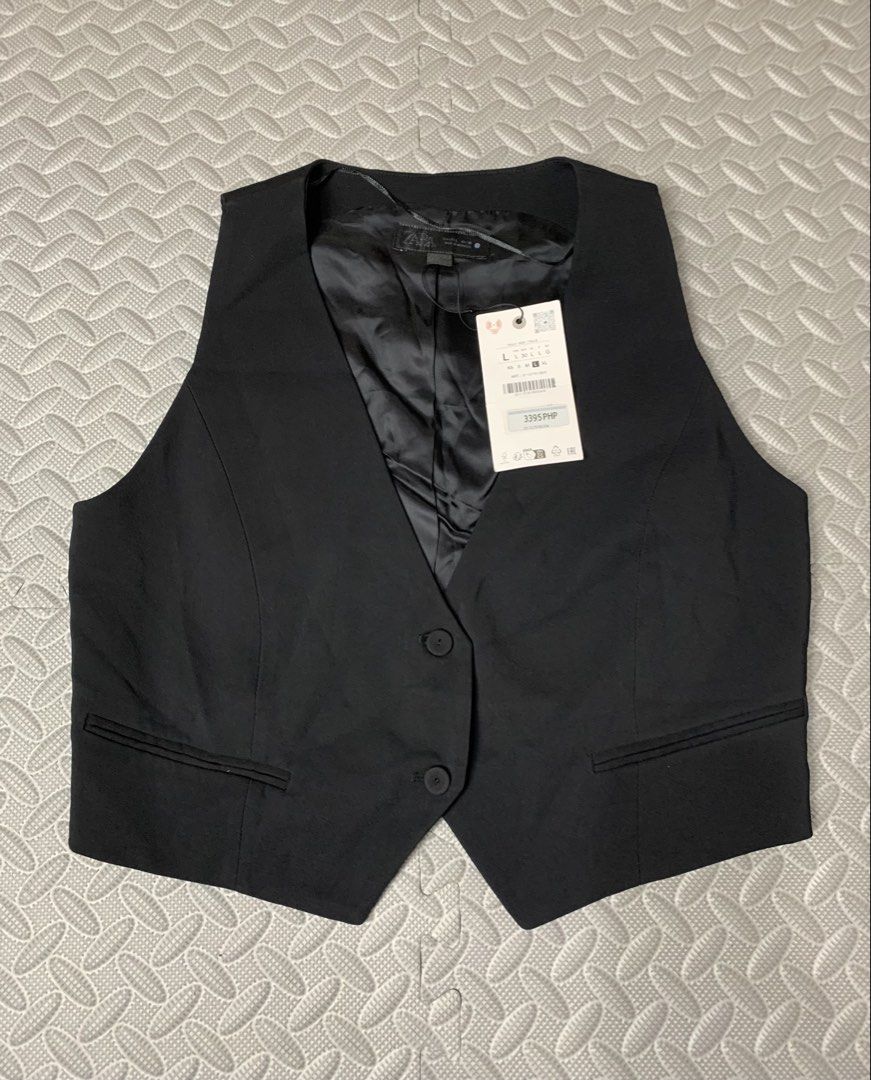 Zara Black Vest - Size L (Category: Sleeveless) located in Pasay City. Submitted by ella8922 (Listing ID 1426757194, Image 1). Description: - Zara black vest - Size L - Brand new with tags - Classic design - Versatile black color - Perfect for layering.