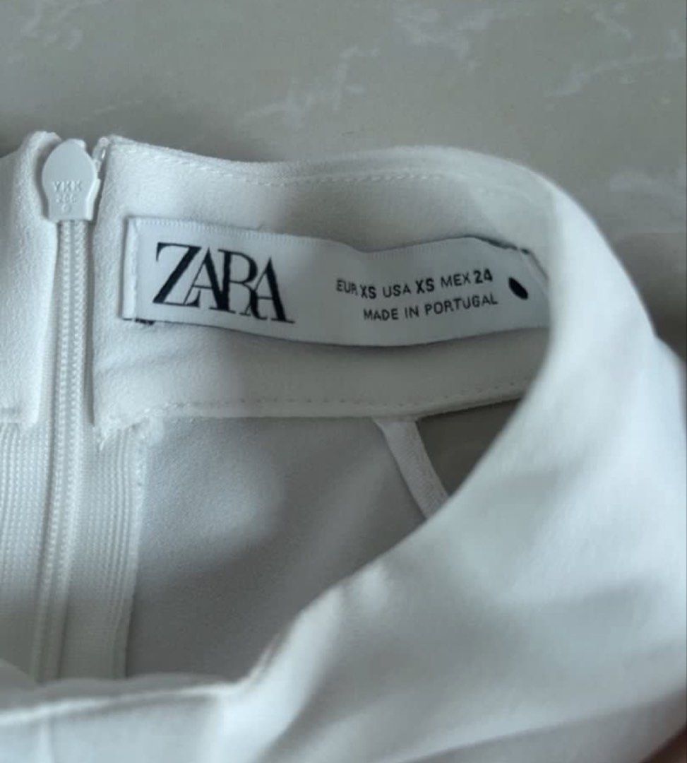 Zara White Halter Top XS (Category: Sleeveless) located in San Juan City. Submitted by decluttzi (Listing ID 1426757837, Image 2). Description: .
