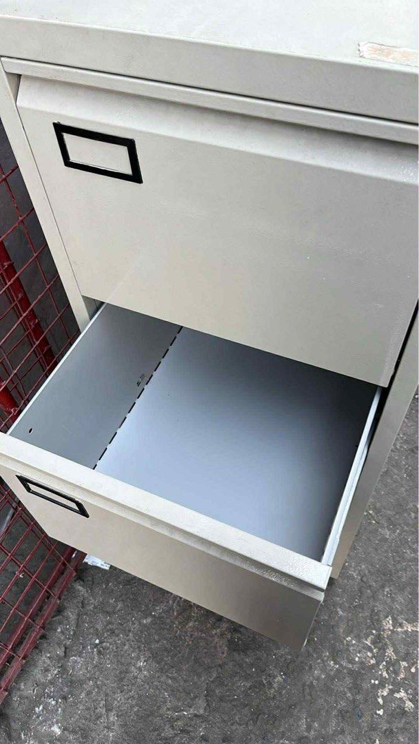 3-Drawer Metal Filing Cabinet (Category: Office Furniture & Fixtures) located in Manila. Submitted by santab01016652 (Listing ID 1426842044, Image 2). Description: Durable metal filing cabinet with three drawers. Features a neutral color and a lock for security. Each drawer has a label holder. Ideal for home or office use..