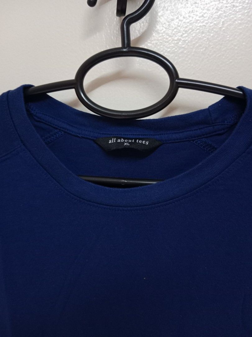 All About Tees Blue T-shirt (Category: Tshirts & Polo Shirts ) located in Makati City. Submitted by jancg55 (Listing ID 1426836026, Image 2). Description: Blue All About Tees t-shirt. It has a crew neck and short sleeves. The tag indicates it is an All About Tees brand. The shirt is a solid blue color..