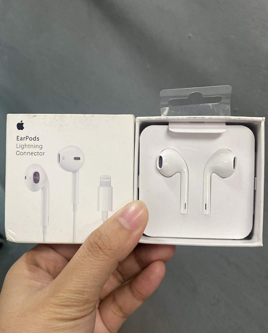 Apple EarPods with Lightning Connector (Category: Earphones) located in Manila. Submitted by pricious (Listing ID 1426796246, Image 1). Description: EarPods with Lightning Connector. Comes with the original box. The earphones are white. The box shows the EarPods and the Lightning connector. The packaging is sealed..