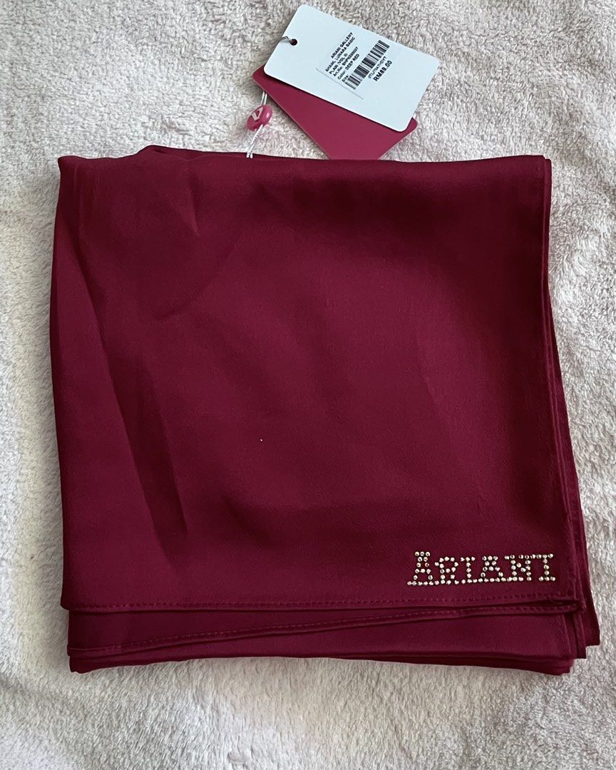 Ariani Satin Shawl in Deep Red/Burgundy/Maroon (Category: Hijabs) located in Kuala Lumpur. Submitted by flsunn (Listing ID 1426798492, Image 2). Description: Normal Price RM89 Brand New bought on 14/3 Reason to sell, bought another shawl Free paper bag.